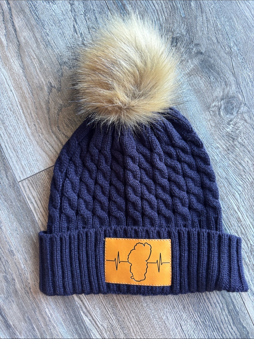 Tahoe Heartbeat Navy Cable Knit Beanie with Tan Faux Fur Pom
